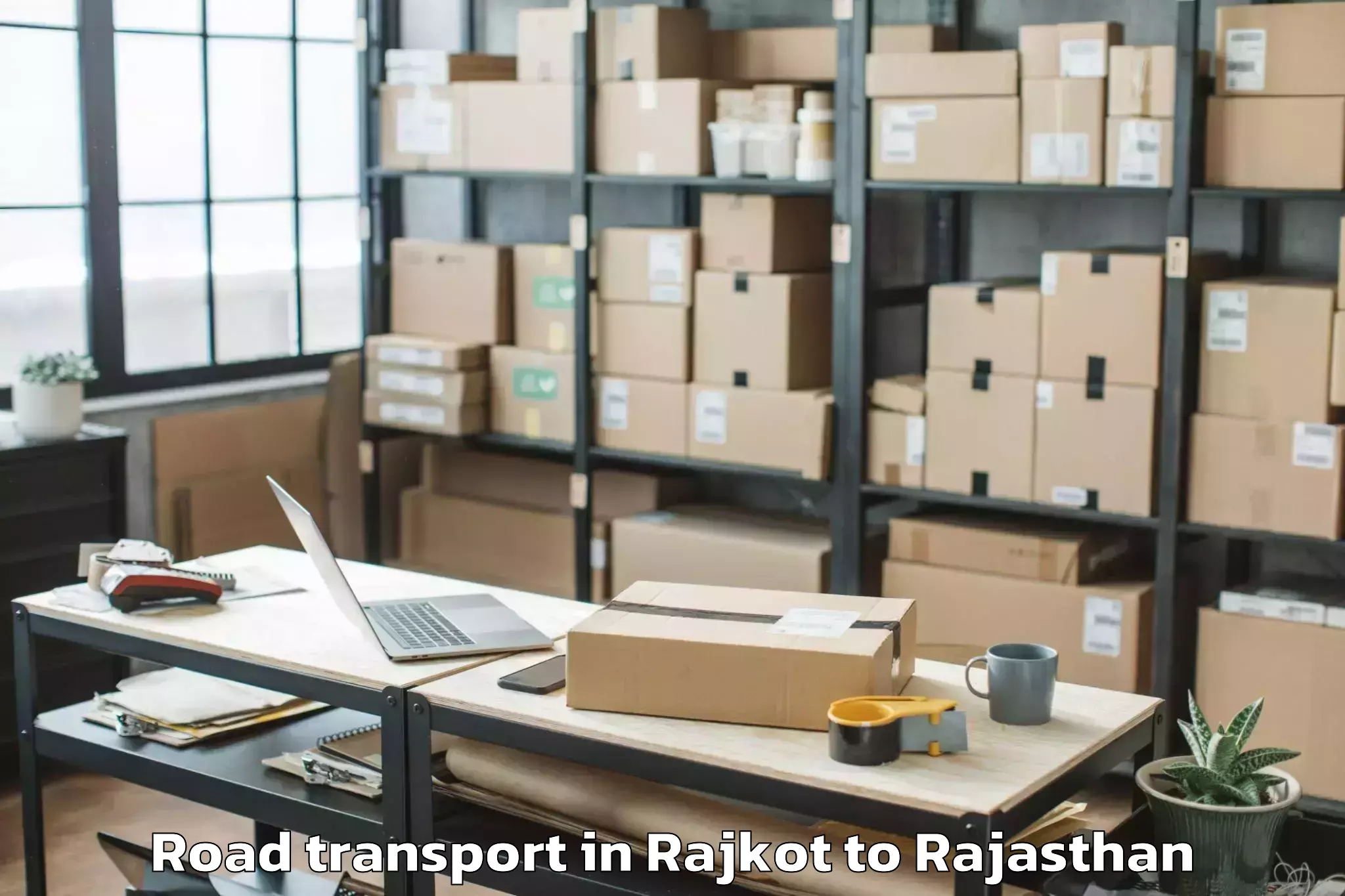 Professional Rajkot to Niit University Neemrana Road Transport